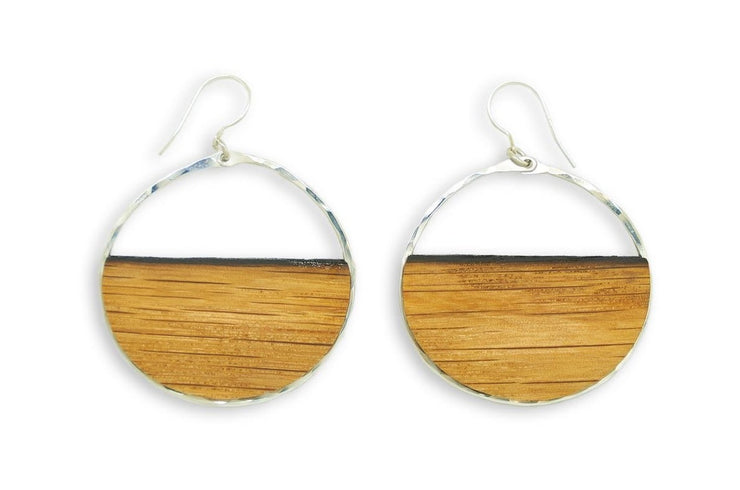 Branch and Barrel Designs hand-cut reclaimed oak barrel stave framed with hand-forged 14k gold fill or sterling silver.