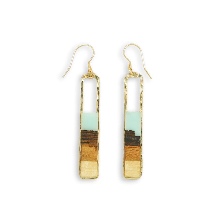 Branch and Barrel “Strata” Turquoise Basswood Rectangle Earrings  Hand cut Basswood framed in hand forged sterling-silver or 14k gold-fill and topped with a hand-tinted turquoise resin.  Buy One, Plant One - One tree planted for every Branch+Barrel piece sold.