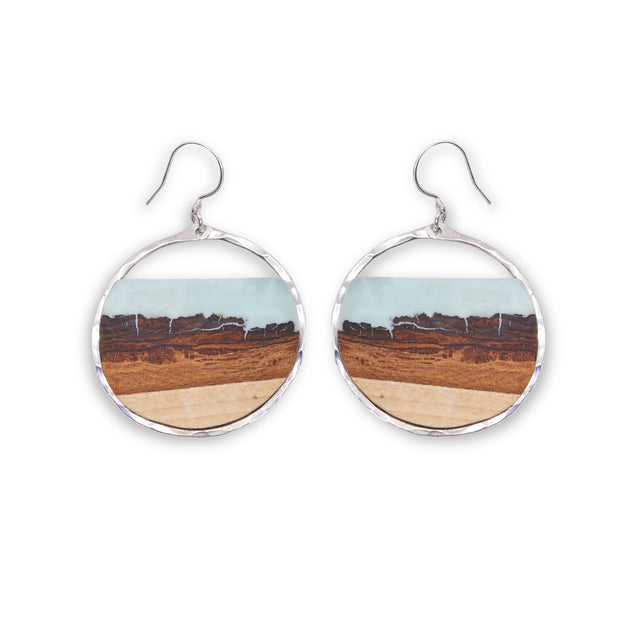 Branch and Barrel “Mesa” - Turquoise Basswood Hoop Earrings - hand cut Basswood framed in hand forged sterling-silver or 14k gold-fill and topped with a hand-tinted turquoise colored resin.  Buy One, Plant One - One tree planted for every Branch+Barrel piece sold.